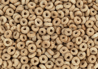 Top view of toasted oat breakfast cereal.