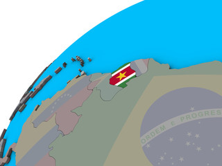 Suriname with national flag on 3D globe.