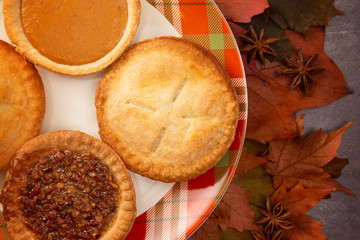 Holiday Table Set with Various Flavors of Fresh Baked Pies © pamela_d_mcadams