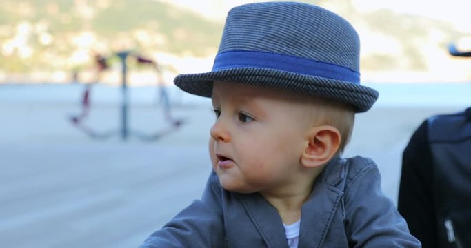 Adorable Eleven Month Old Baby Boy With His Italian Hat And Suit Jacket. Close Up View Portrait - DCi 4K Resolution