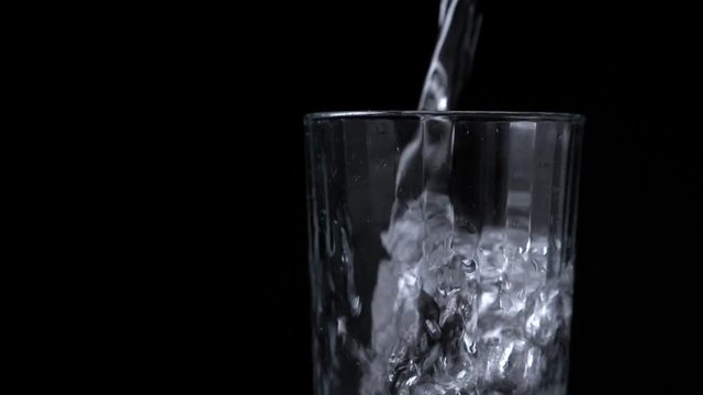 Pouring clean water into the glass