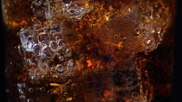 Fizzling coca cola in the glass