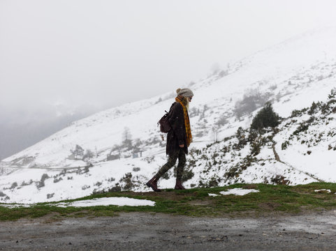 Woman walking in mountains