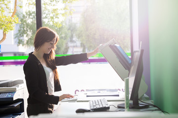 Young student at a copy center