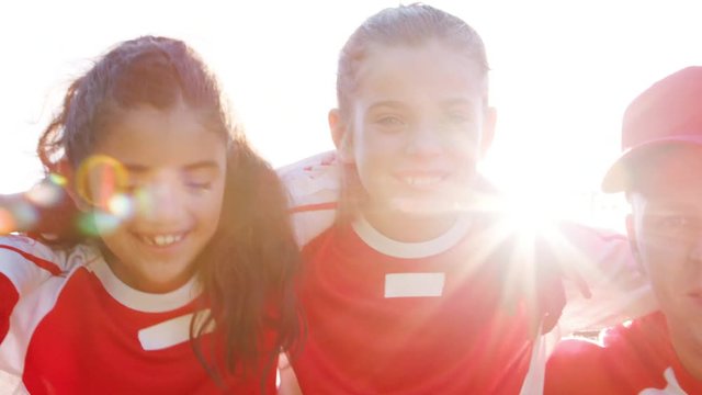 Portrait Of Girls Sports Team And Coach Shot In Slow Motion