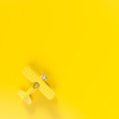 airplane toy minimal concept on yellow background