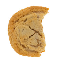 Top view of a broken cookie filled with cookie butter isolated on a white background.