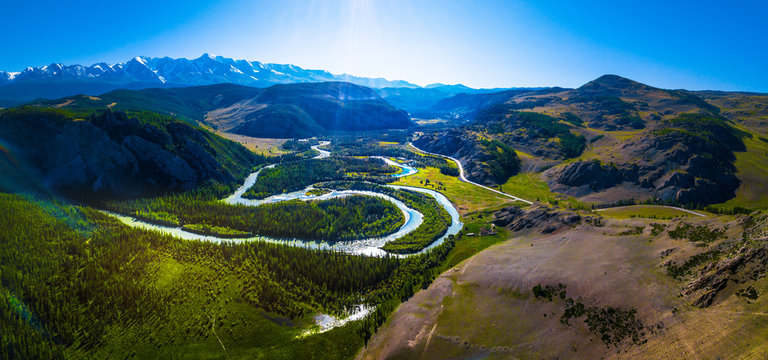 Aerial panorama of the mountains and river in Altai, Russia. Northern Chuysky Range and the river of Chuya.