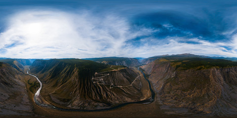 Spherical, 360 degrees, seamless aerial panorama of the Katu Yaryk mountain pass and the valley of...