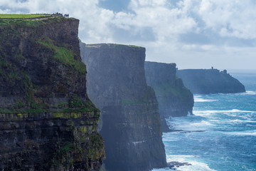 The famous Cliffs of Moher at the Irish west coast on a misty day