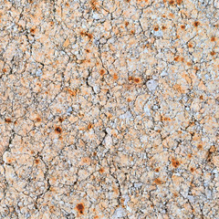 Very close view of an old brick surface weathered by the elements.