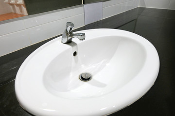 Fototapeta premium Sink and faucet decoration in bathroom interior