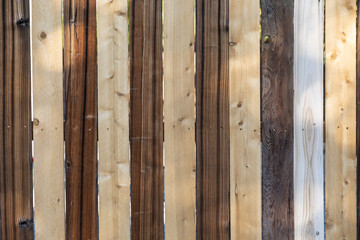 Weathered wood background surface. Wooden wall texture different colored planks.