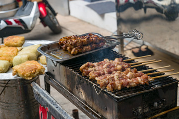 Meat barbecue on street market in Hanoi, Vietnam, Asia