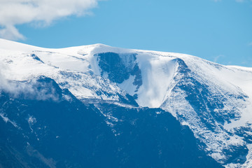 Fototapeta na wymiar Mountains covered with snow. Northern Chuysky Range, Altai, Russia