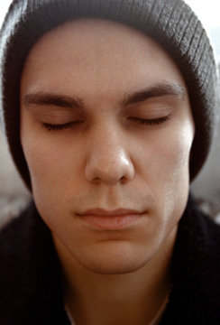 Portrait of a young guy in the studio