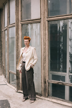 attractive woman of fifty years with red hair