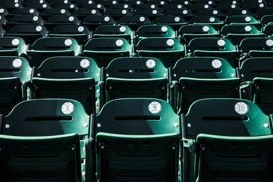 Empty baseball fold up chairs in stadium