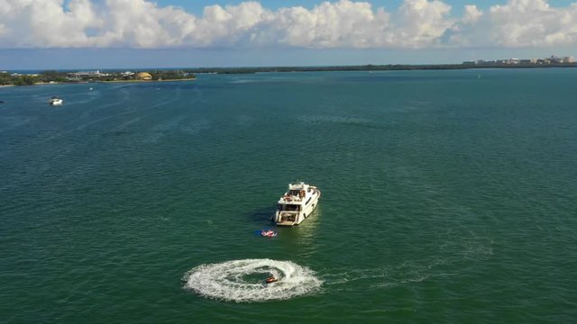 Stock aerial footage Miami jetski and yacht