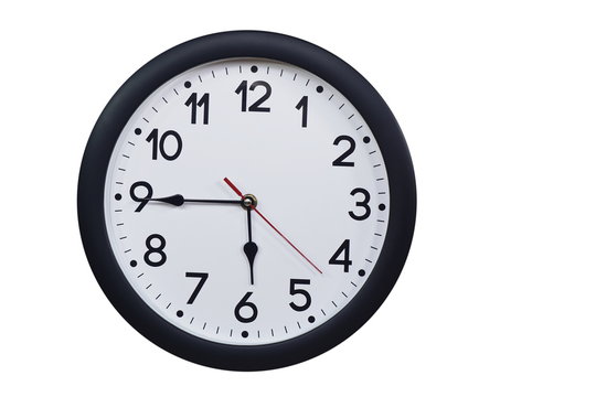 Time concept with black clock at a quarter to six