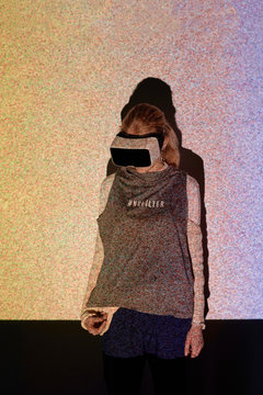 Woman exploring virtual night sky