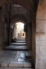 stone steps through arches
