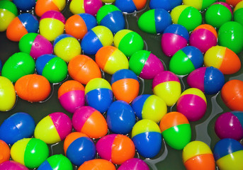 Fototapeta na wymiar Colorful plastic eggs.