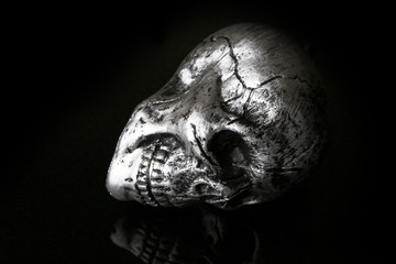 Human skull Halloween dark scary horror story ideas concept isolated on black background