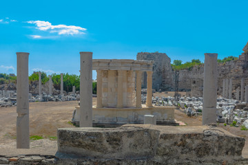 The ruins of the ancient Roman city of Side in Turkey. The remains of buildings, theater and other infrastructure of the ancient city. Historical monuments of ancient Greek and Roman eras.