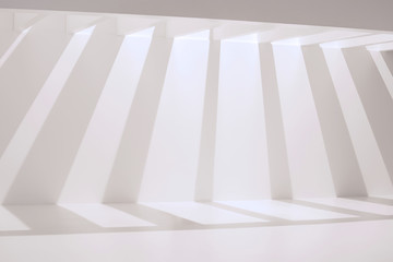 empty white wall and stripe shadows