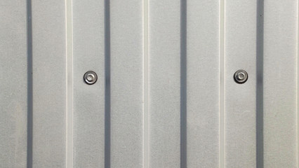 Obraz premium The gray wall of the metal profile.Abstract background.