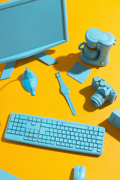 Blue office supply on yellow background.