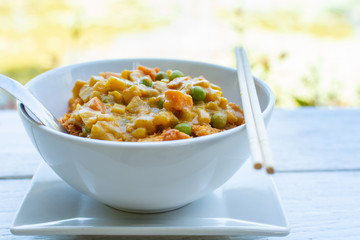 Japanese curry served with Japanese rice in white bowl clean and healthy food.