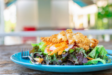 Fried chicken salad on green clean and healthly diet food.