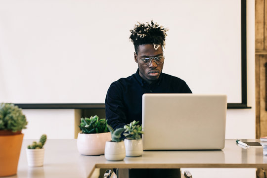 Portrait of Hip African American Man Working on Laptop
