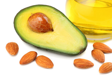 healthy food. mix of avocado, almonds, avocado oil isolated on white background