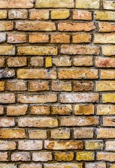 Naklejka premium background of dark orange brick laid horizontally 