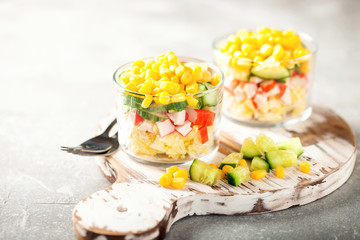 Salad with crab sticks,  corn and fresh cucumber