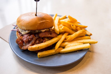 chicken schnitzel burger, bacon with chips