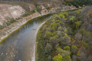 Aerial drone shot of drift boat fly fishing in Ontario, Canada
