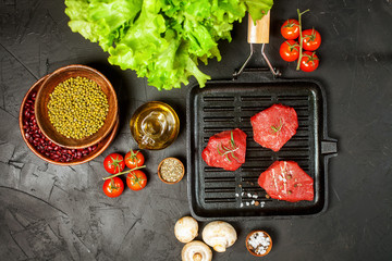 Raw steak fillet with vegetables