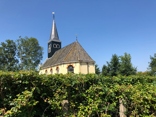 Fototapeta na wymiar Church the PKN de Hoekstien in Ferwoude