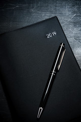 スケジュール帳とペン