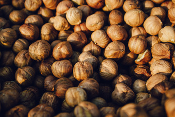 Hazelnut Background. Top view heap of peeled hazelnuts.