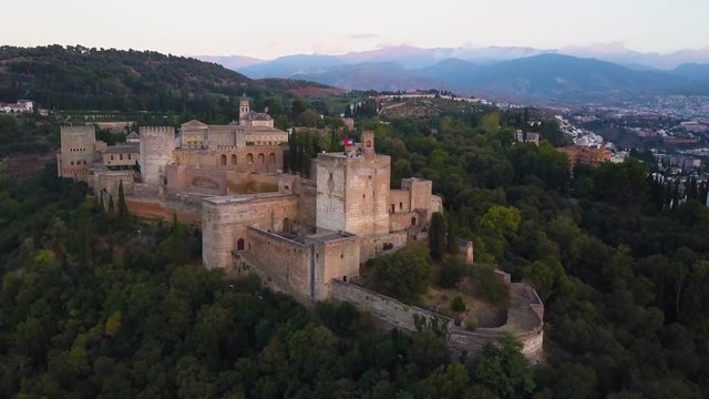 4k drone - Medieval castle, The Alhambra Palace, at sunset.  Granada, Spain.