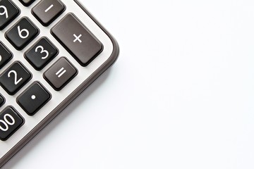 Fototapeta premium Business, finance, savings money, investment, taxes or accounting concept : Top view or flat lay of calculator on white background with copy space ready for adding or mock up