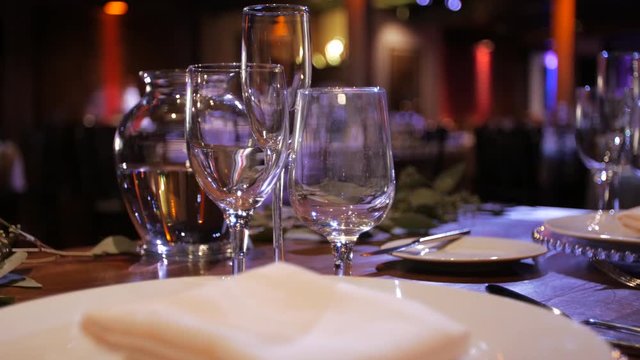 Wedding table setting wine glasses and plates