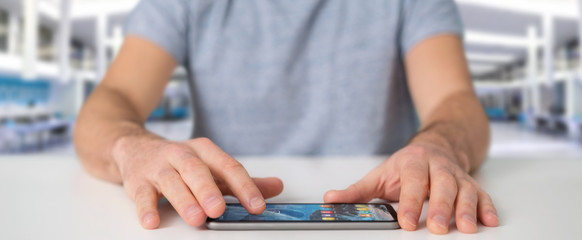 Businessman using modern mobile phone
