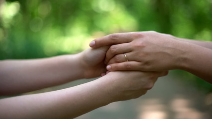 Gay wedding, same-sex partners exchange marriage vows, creating family, closeup