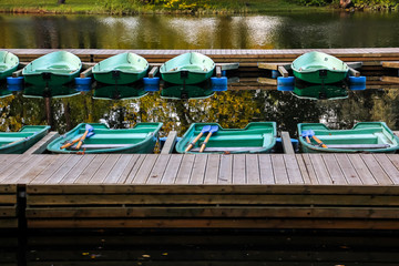 Fototapeta na wymiar Beautiful autumn, boats moored at the rental station on Elagin island, Saint-Petersburg, Russia.